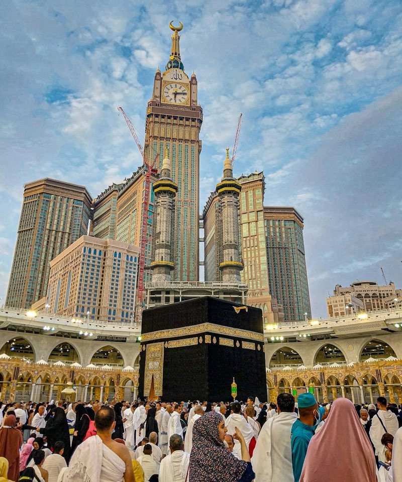 The Kaaba in Masjid al-Haram with the Abraj Al Bait clock tower, Makkah