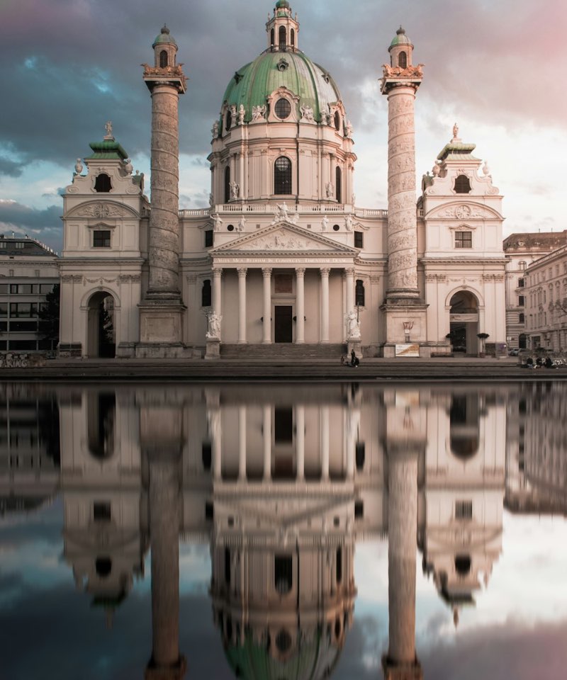 Karlskirche reflected in its pool, Vienna